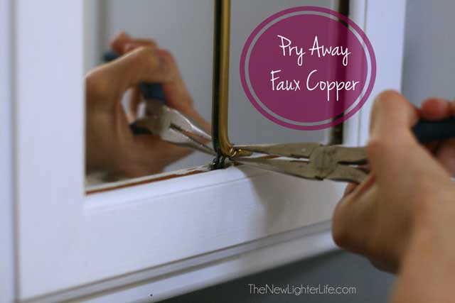 prying-faux-copper-from-paneled-mirror