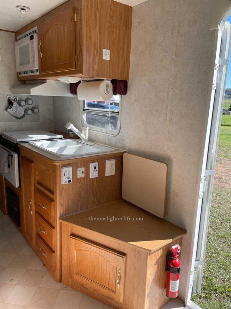 Renew Those Cabinets A Step By Step Guide To Painting Camper Cabinets   Kitchen Before View 768x1024 